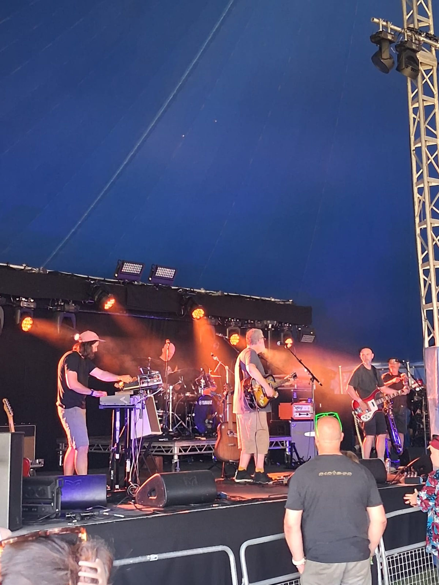 Lo-Hi-Lo performing on an outdoor stage